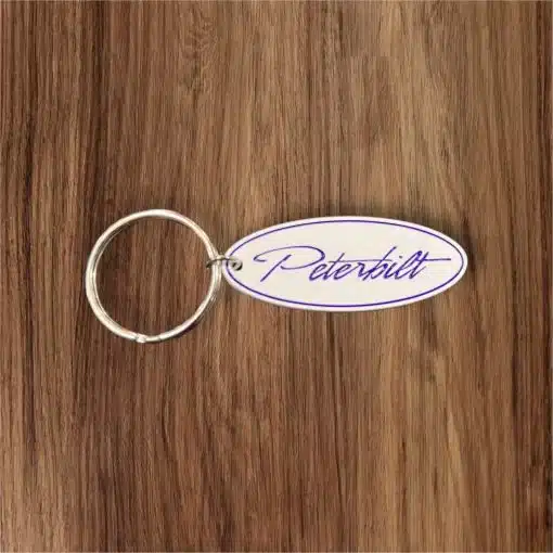 Peterbilt White Oval Metal Keychain - Image 2