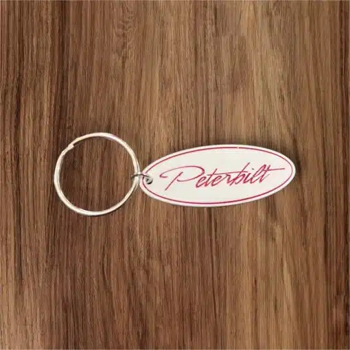 Peterbilt White Oval Metal Keychain